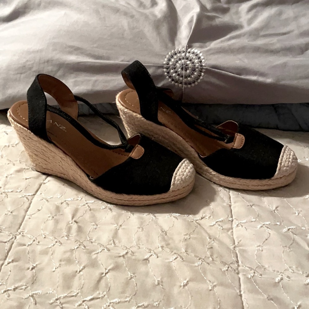 Solanz black sling back espadrilles.